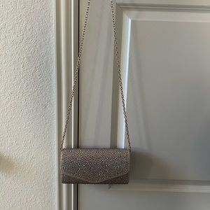 Beautiful Beaded Clutch with Gold and an additional Silver Chain.